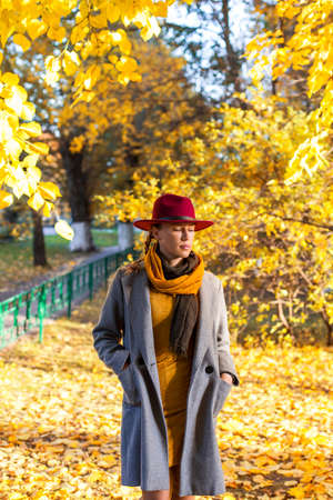 girl walking in the autumn city