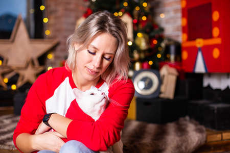 Christmas Party, Winter Holidays Woman With Cat.の写真素材