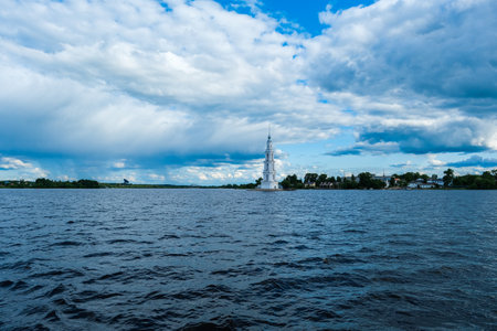 The bell tower surrounded on all sides by water in the city of Kalyazin Russia
