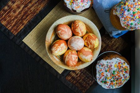 Close-up view of chicken eggs, homemade easter cake and willow twigs