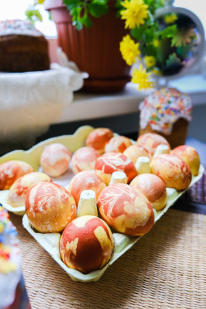 Close-up view of chicken eggs, homemade easter cake and willow twigs