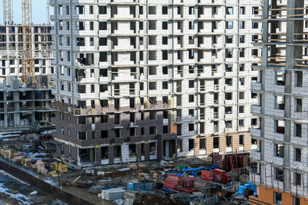 Construction of modern high-rise residential buildings.