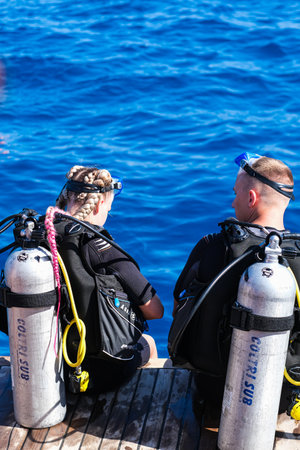 Scuba diver before diving. A diving lesson in open water. High quality photoの写真素材