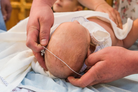 The details chriistening ceremony in the churchの写真素材
