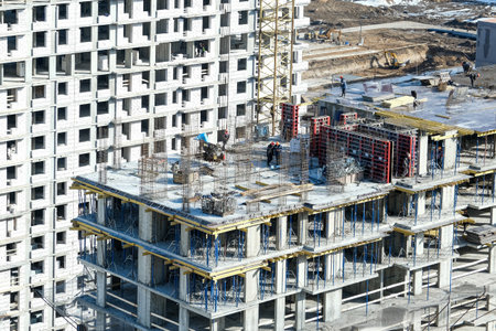 Construction of modern high-rise residential buildings.