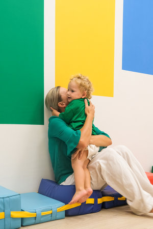 child and mom in kindergartenの写真素材