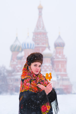A woman in a Russian folk headscarf in the Moscowの写真素材