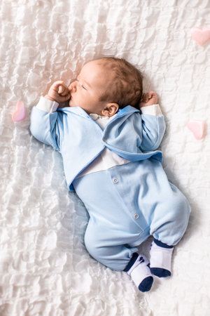 One month old baby girl on soft blanket. High quality photoの写真素材