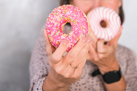 Donut on a colored background round. High quality photoの写真素材