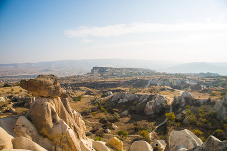 Valley of doves panoramic view near Uchisar castle in sunrise, Cappadocia, Turkey. High quality photoの写真素材