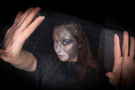 Girl with fancy makeup for a Halloween holiday. High quality photo