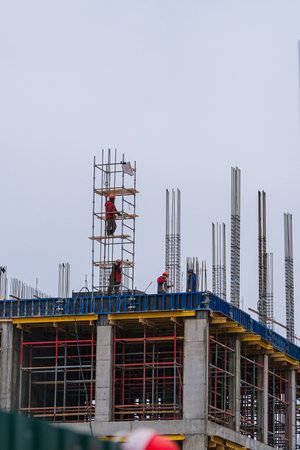 Construction of the building, erection of metal structures for pouring a new floor. High quality...