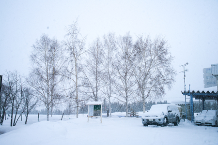 Landscape view of a train station in Otaru covered in snowのeditorial素材