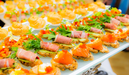 Delicacies and snacks in the buffet. Seafood. A gala reception. Banquet. Catering.の写真素材