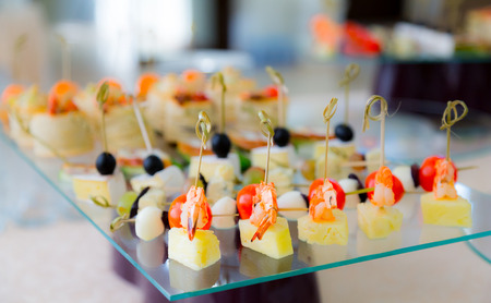 Delicacies and snacks in the buffet. Seafood. A gala reception. Banquet. Catering.の写真素材