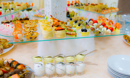 Delicacies and snacks in the buffet. Seafood. A gala reception. Banquet. Catering.の写真素材