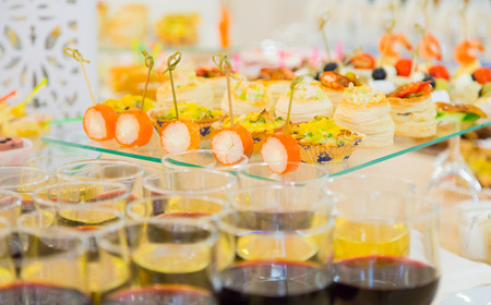 Delicacies and snacks in the buffet. Seafood. A gala reception. Banquet. Catering.の写真素材