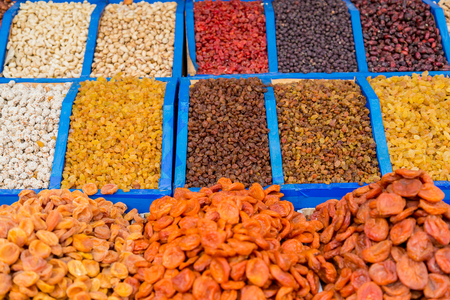Various dried fruits on the counter of the Bazaar.の写真素材