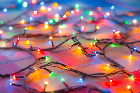 Colored lights Christmas garlands. Colorful abstract backgroundの写真素材