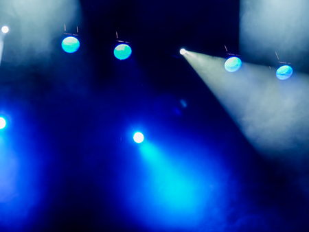 Lighting equipment on the stage. The spotlight through the smoke. Theater performance.の写真素材