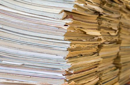 A stack of old school notebooks. Multicolored cover.の写真素材