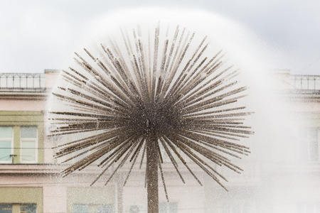 Water fountain in the city. Fountain in the form of a dandelion.