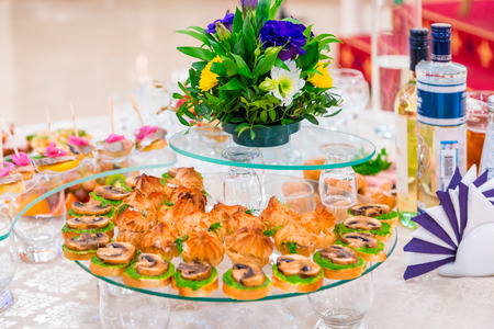 Delicacies and snacks at the Banquet. Corporate event. Outside catering. Buffet.の写真素材