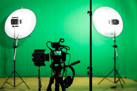 Studio for filming on a green background. The chroma key. Lighting equipment in the Studio. Green screen.の写真素材