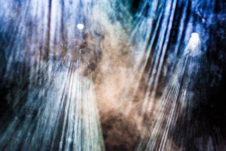 Theatrical smoke on stage. Lighting equipment. Theatrical performance or show.の写真素材