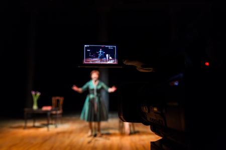 Filming performances of the actress or singer in the interior. A digital video camera. Color led display. The TV Studio.の写真素材