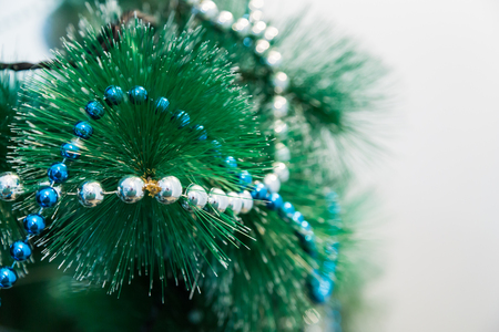 Garlands and decorations on a Christmas tree. New year.の写真素材