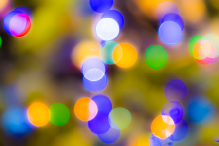 Abstract blurred background. Decorated Christmas tree. The bokeh effect.の写真素材