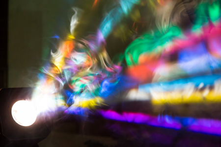 The colored rays of light. A theatrical performance, concert or disco. Lighting equipment.の写真素材