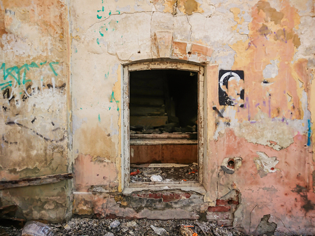 Destroyed house after a fire. Old brick building with Windows.の写真素材