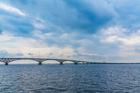 Road bridge over the Volga river between Saratov and Engels, Russia. Cloudy summer day.の写真素材