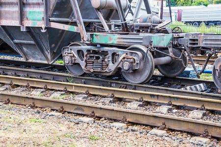 Cars of a freight train at the station. Railway rails and sleepers.の写真素材