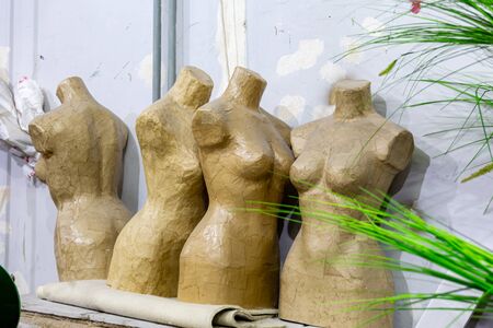 Four female mannequin made of papier mch in the theater art studio.の写真素材