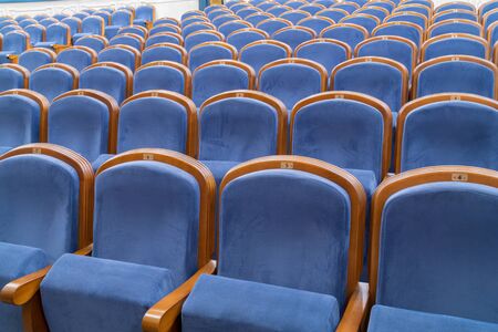 Blue plush chairs in the auditorium of the theater. The interiors of the concert hall.の写真素材