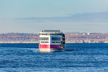 Saratov, Russia - October 21, 2020: Four-deck luxury cruise ship "Mustai Karim" of the PV300 project of the Vodohod company on the Volga River. A sunny autumn dayのeditorial素材