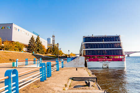 Saratov, Russia - October 21, 2020: River station. The stern of the motor ship "Mustai Karim". City pier on the Volga River. A sunny autumn dayのeditorial素材