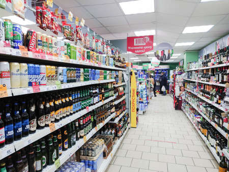 Saratov, Russia - December 18, 2021: Alcoholic beverages on supermarket shelves: drinks, beer, wine.のeditorial素材