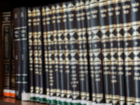 Books on the shelves in the library. defocused image.の写真素材