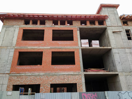 Construction of a three-storey brick house.の写真素材