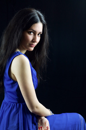 beautiful woman in blue dress, copy spaceの写真素材