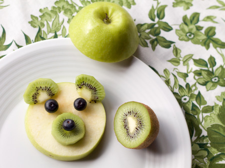 baby bear face made of fruit, fun dessert for childrenの写真素材