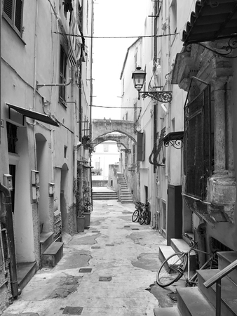 narrow path between houses called carruggio in liguria Italyの写真素材
