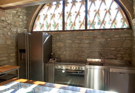 modular steel kitchen with large fridge and dishwasherの写真素材
