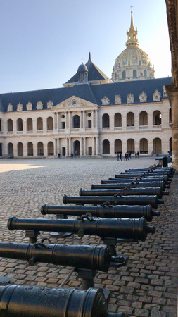 PARIS - FEBRUARY 24, 2018: group of cannons  in the central courtyard  of les invalides in Paris. The National Residence of the Invalids and Army Museumのeditorial素材