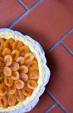 prunes tart ready for cooking in the oven, copy spaceの写真素材