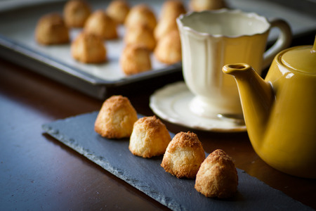 coconut cookies just baked on the table for breakfast, defocused backgroundの写真素材